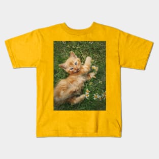 orange kitten among daisies Kids T-Shirt